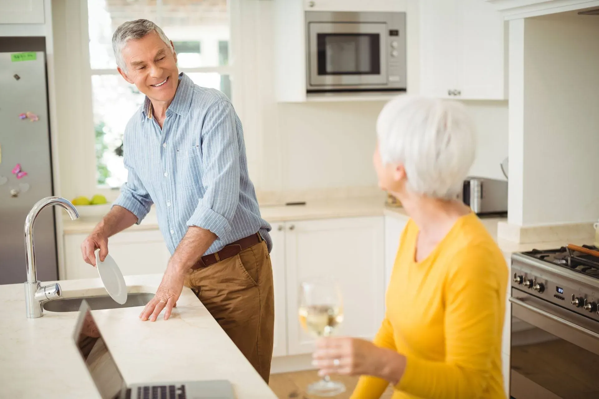 people talking in kitchen
